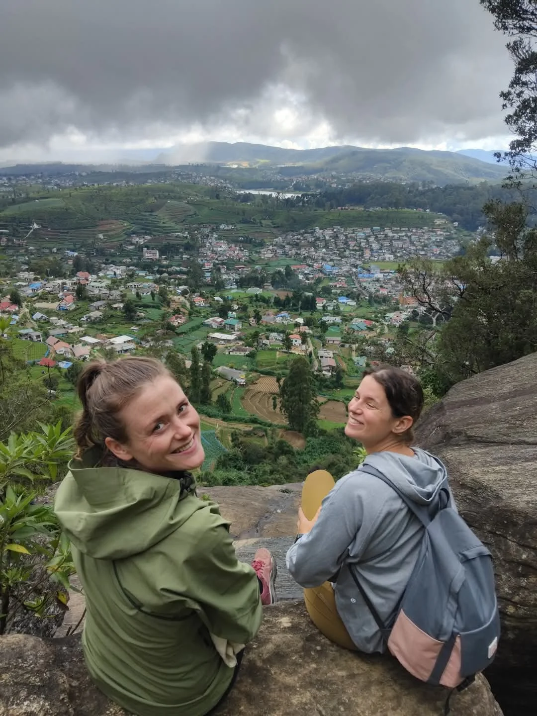 Waterfall hike through green highland trail